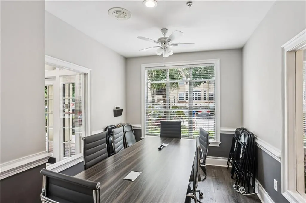 Office featuring dark wood-style flooring and a ceiling fan
