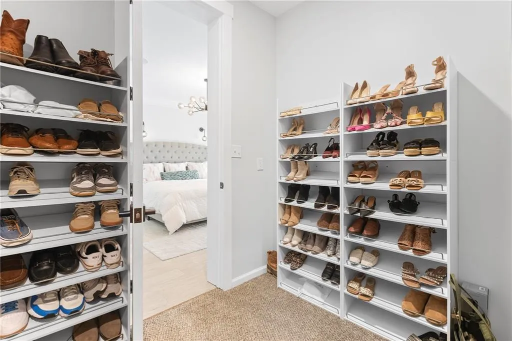 Enviable shoe storage in this primary closet
