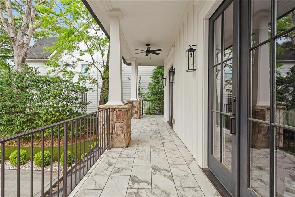 This balcony off the foyer and office runs the entire width of the house.