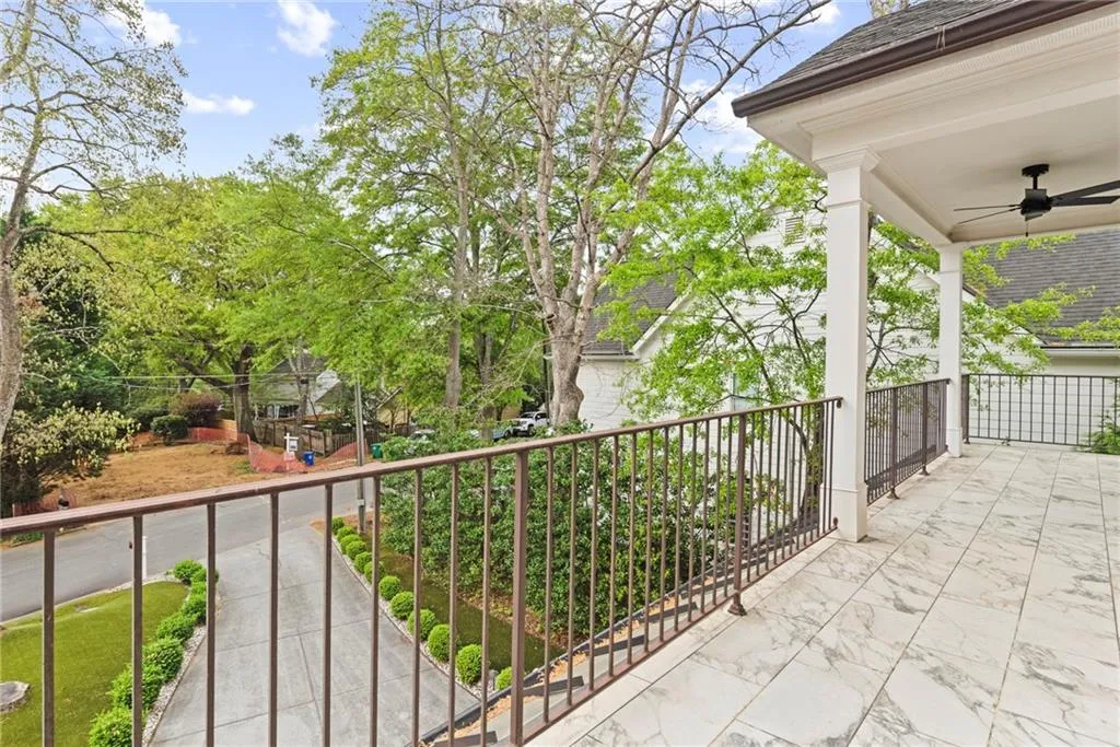 Both front bedrooms share access to this balcony