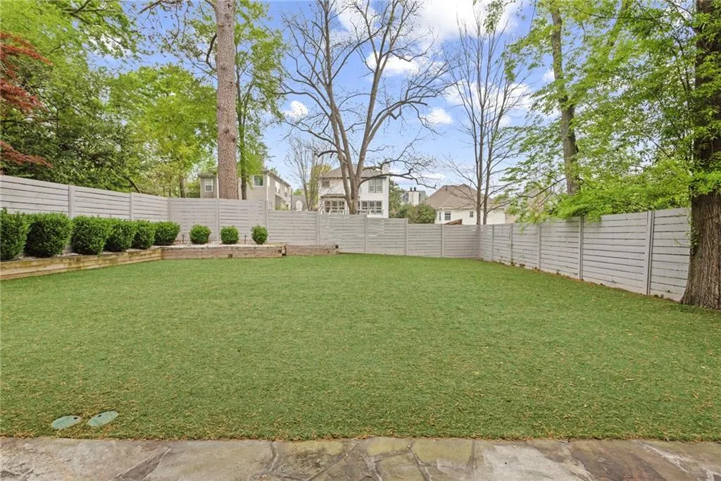 Flat level back yard!! Maintenance free!