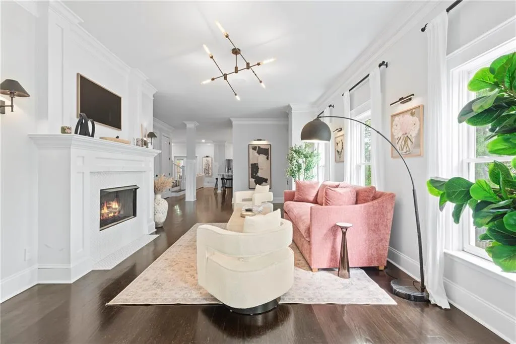 See through gas fireplace, trendy ceiling fixure and wall sconses