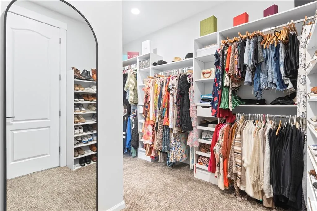 Primary Walk in closet has lots of storage
