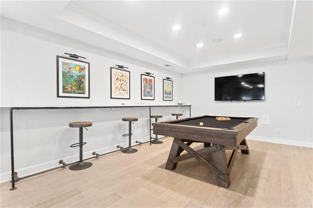 Watch the game while you're shooting pool with your fans observing!