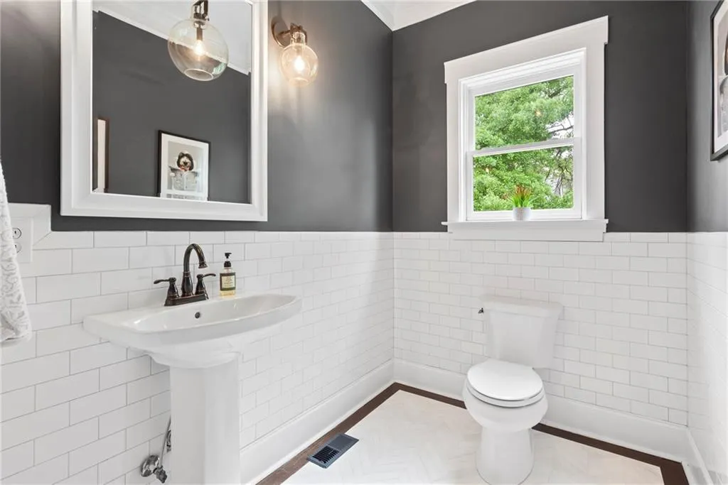 Main level powder room sspaciuos and bright.