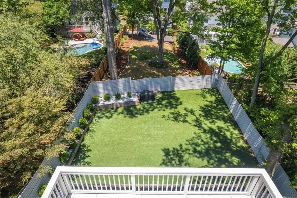 Great View of the large flat yard from the primary balcony