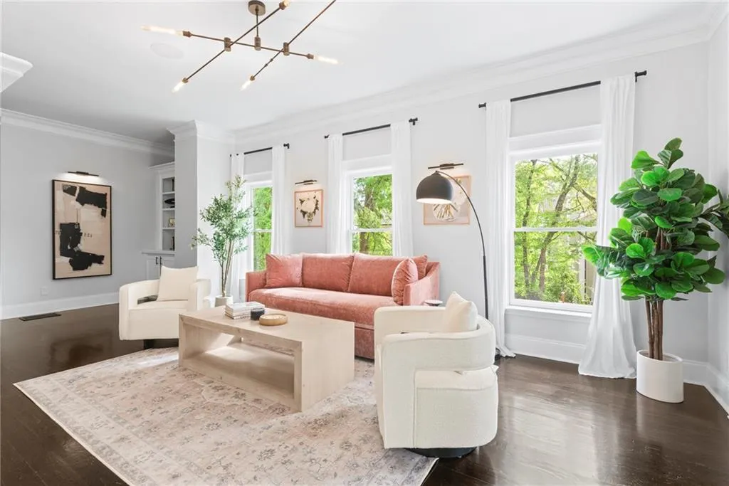 Wall of windows provides lots of natural light - beautiful hardwood floors