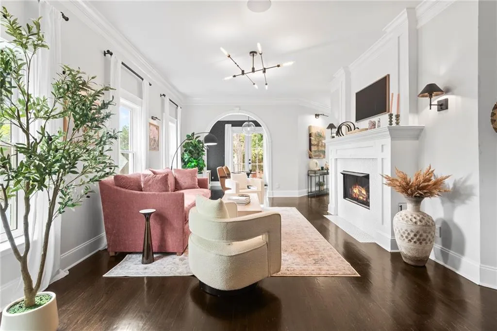 See thru fireplace, lots of windows and trendy lighting makes this a comfortable living space