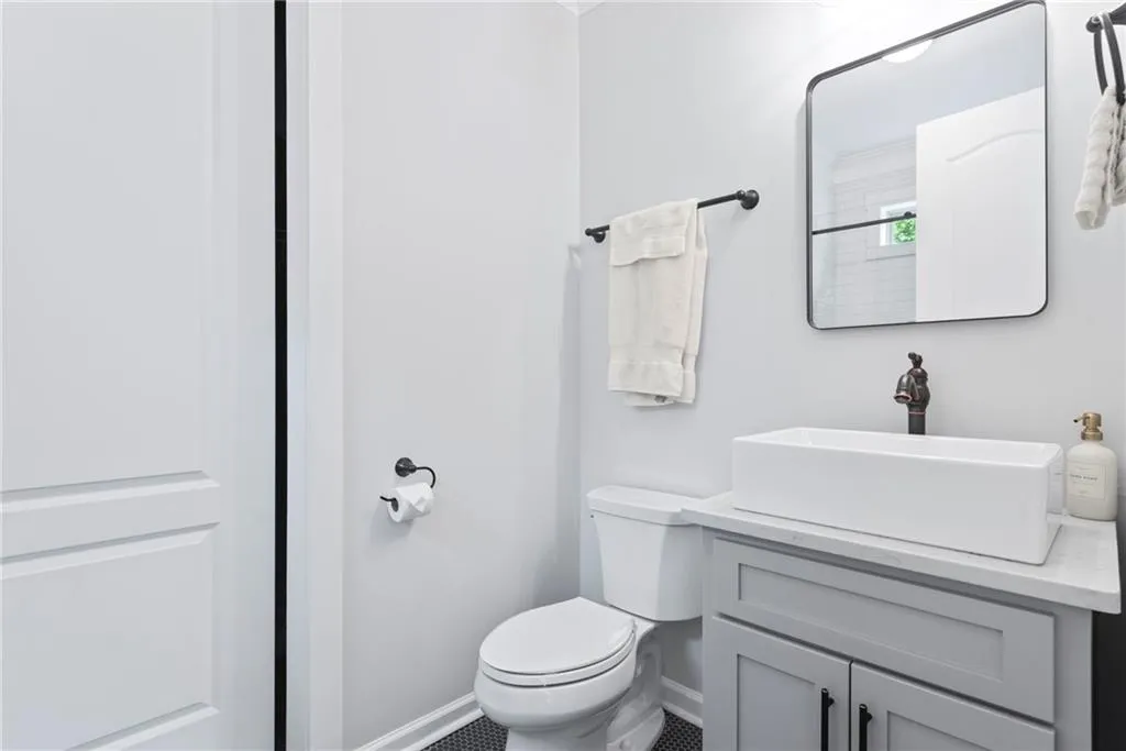 Farm vessel sink in this very cool bathroom - walk in closet!