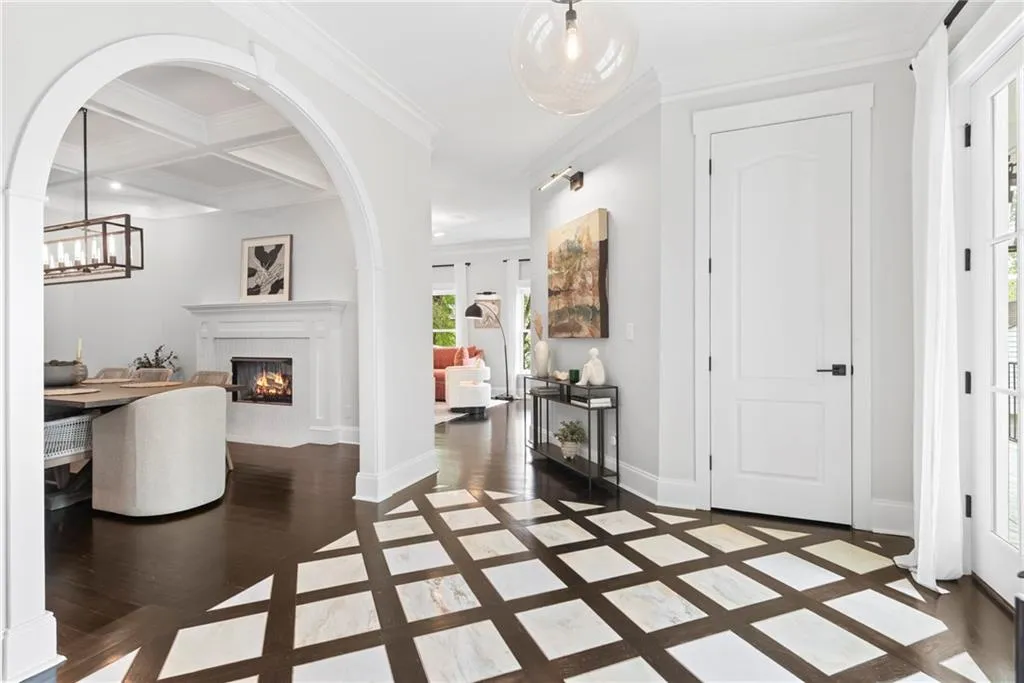 Dining room to the left with see-thru fireplace. Great ligting throughout!