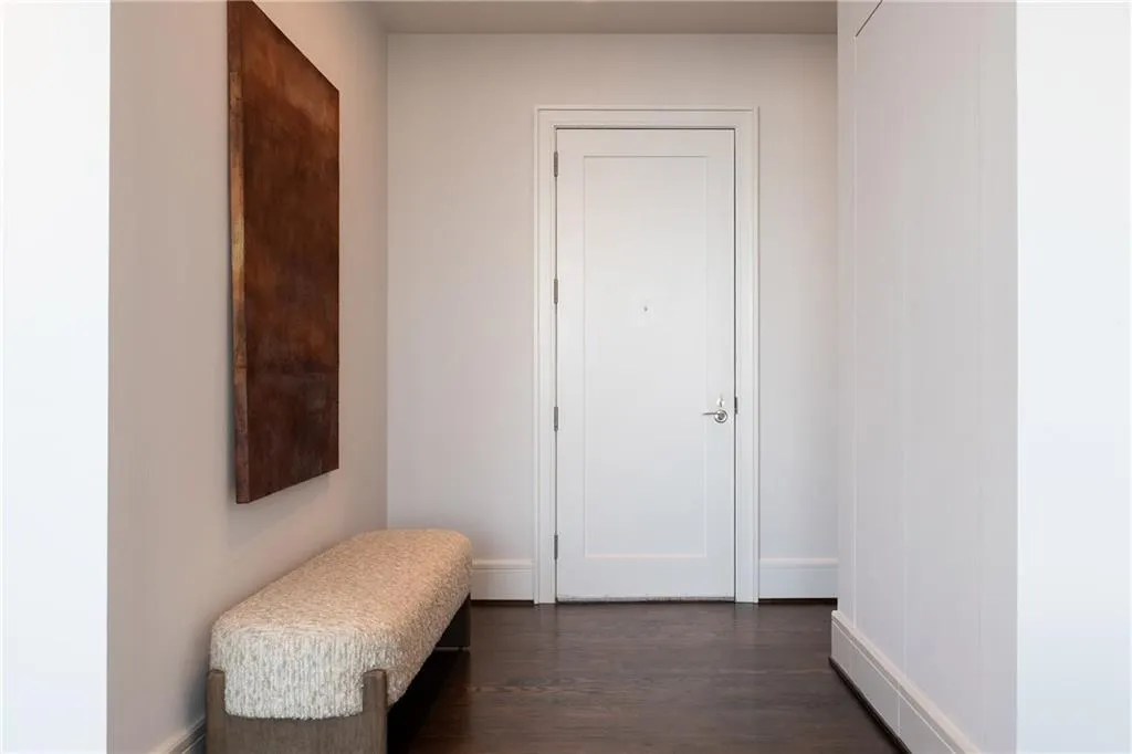 Foyer with flush/invisible closet.