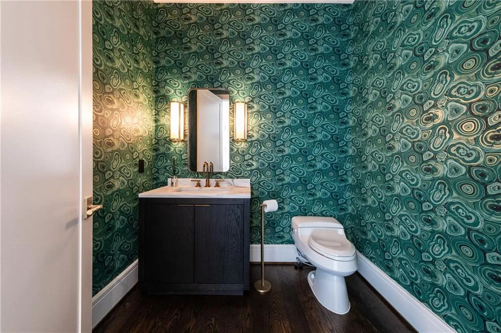 Powder room in foyer.