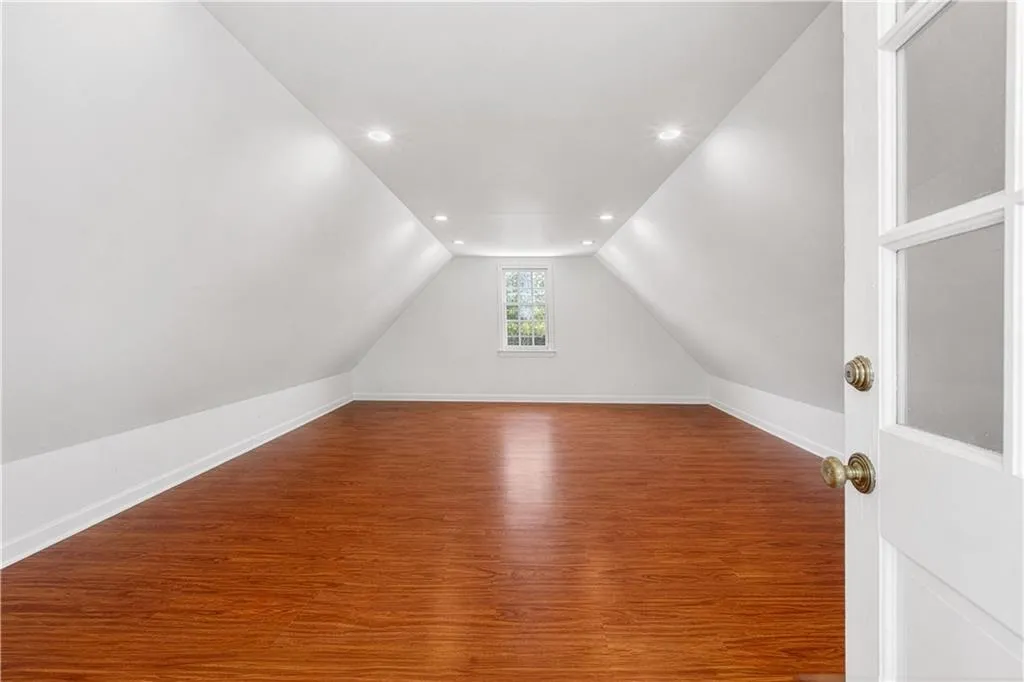 Finished/unconditioned storage over 2 car garage