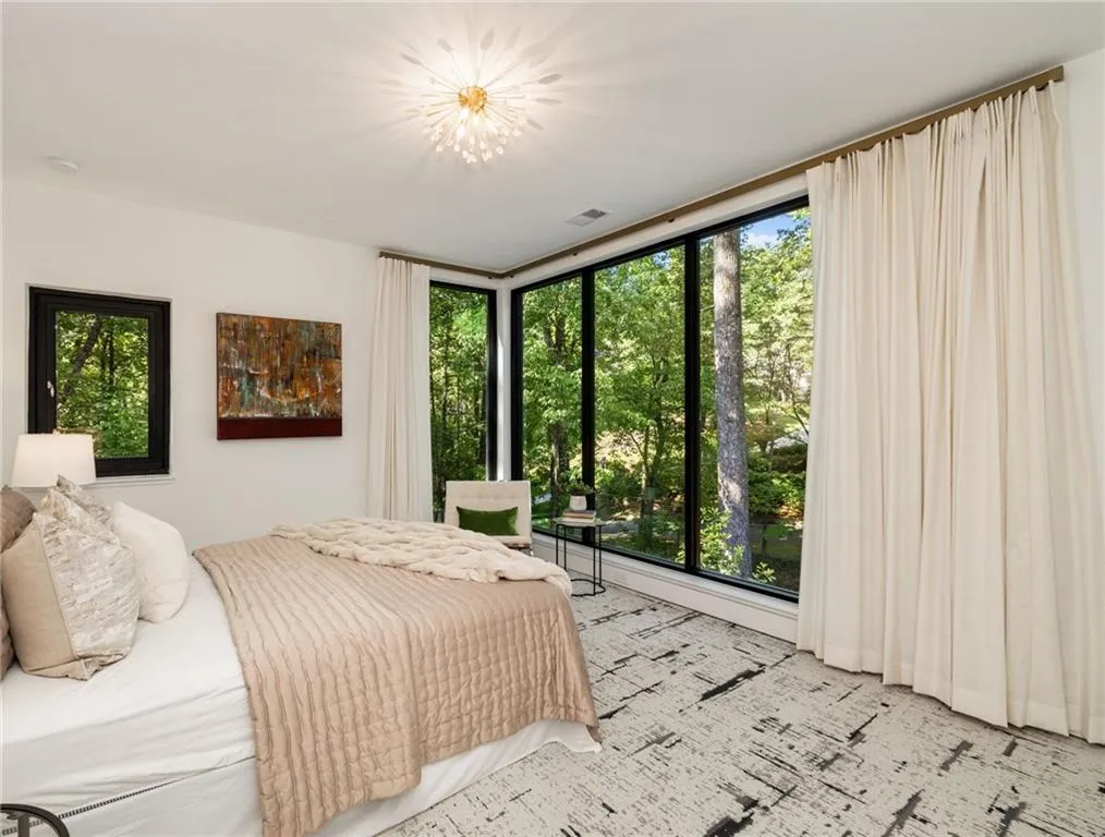 Bedroom featuring multiple windows