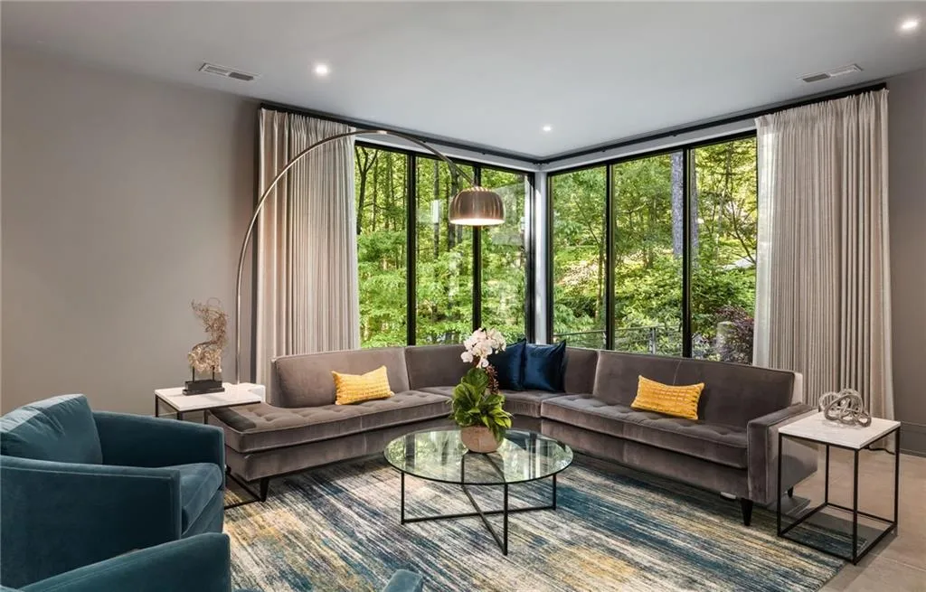 Living room featuring expansive windows