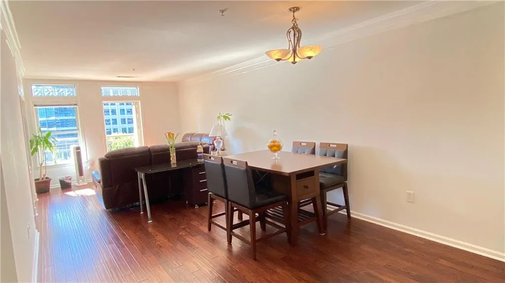Hardwood flooring, crown molding, and recessed lighting
