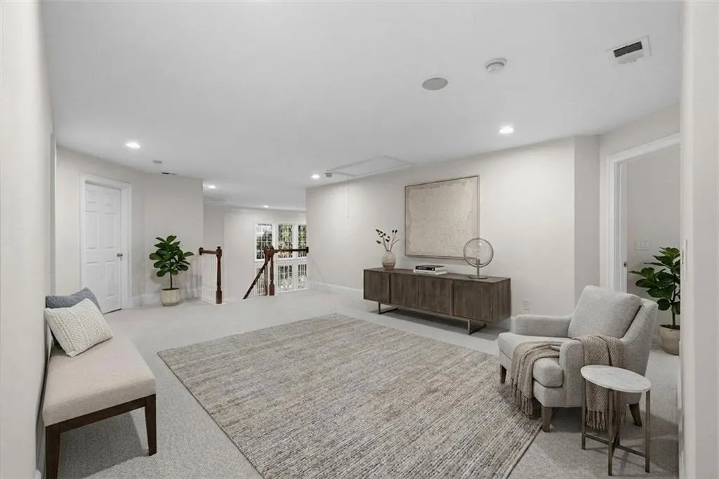 Virtually staged loft—perfect for a living space, office, or playroom.