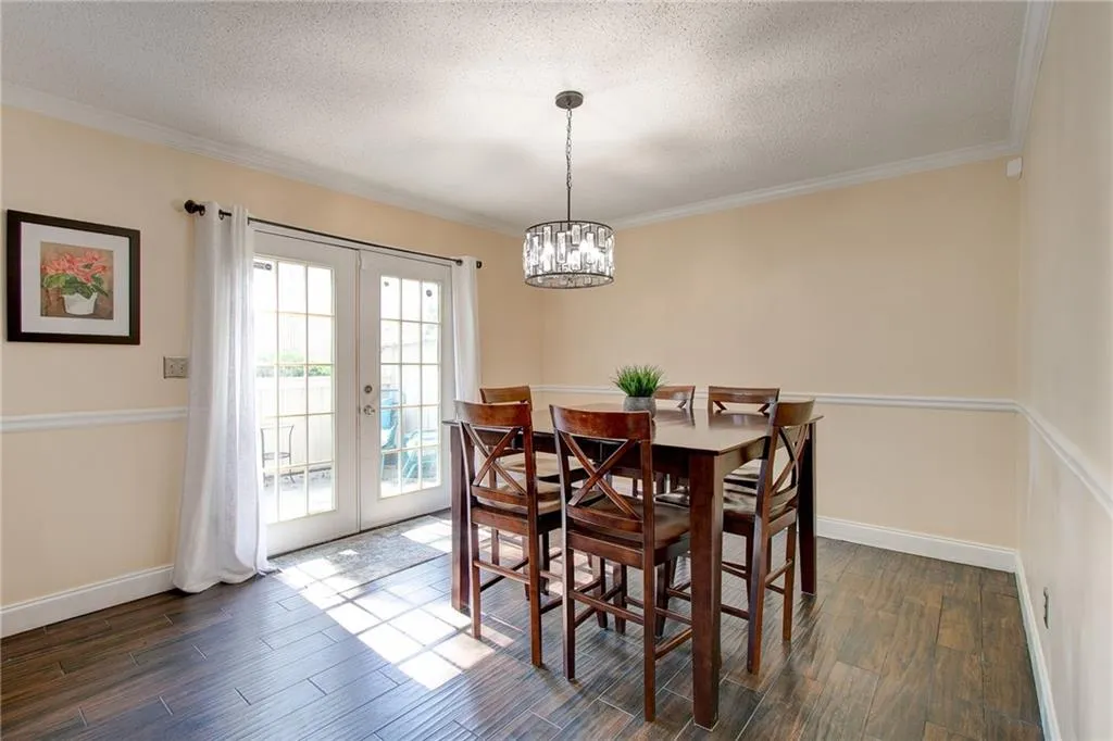 Dining space featuring french doors that lead to your private patio