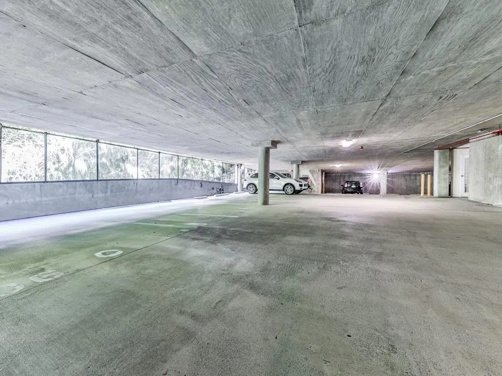 Parking 104 and 105 is covered and at the door to elevator.  Extremely convenient!