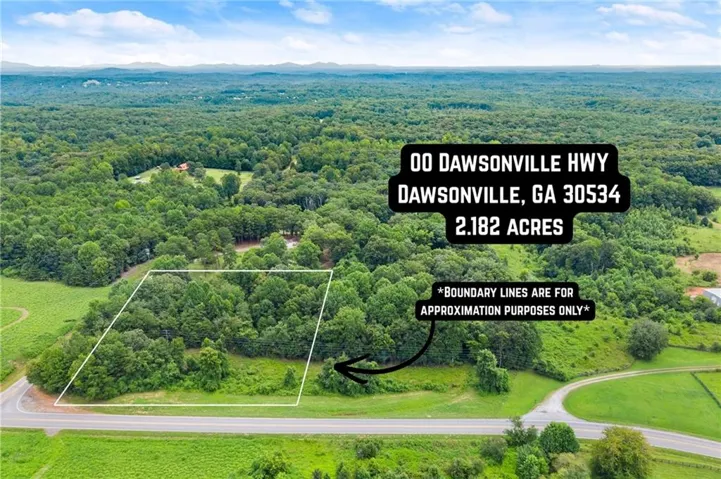 Expansive 2.182-acre lot featuring dense tree coverage