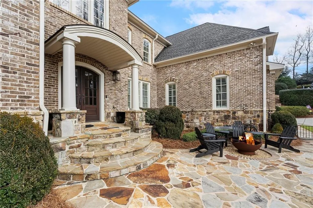 View of patio / terrace featuring an outdoor fire pit