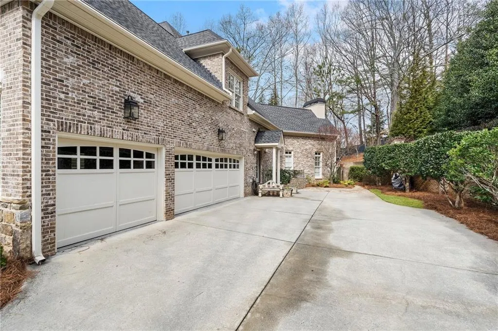 View of property exterior with a garage