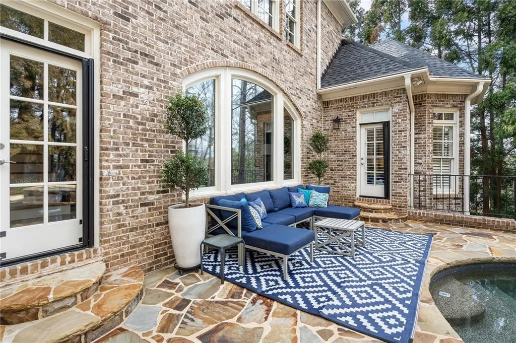 View of patio with an outdoor living space