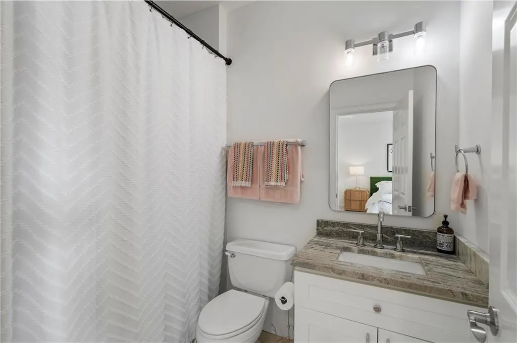 Bathroom with vanity and toilet