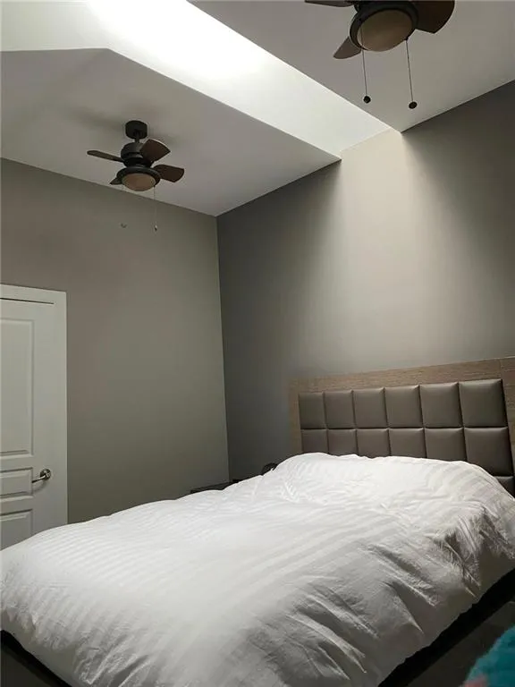 Bedroom featuring ceiling fan Bedroom featuring ceiling fan