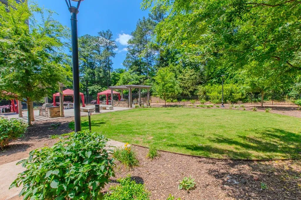 View of yard featuring a pergola View of yard featuring a pergola