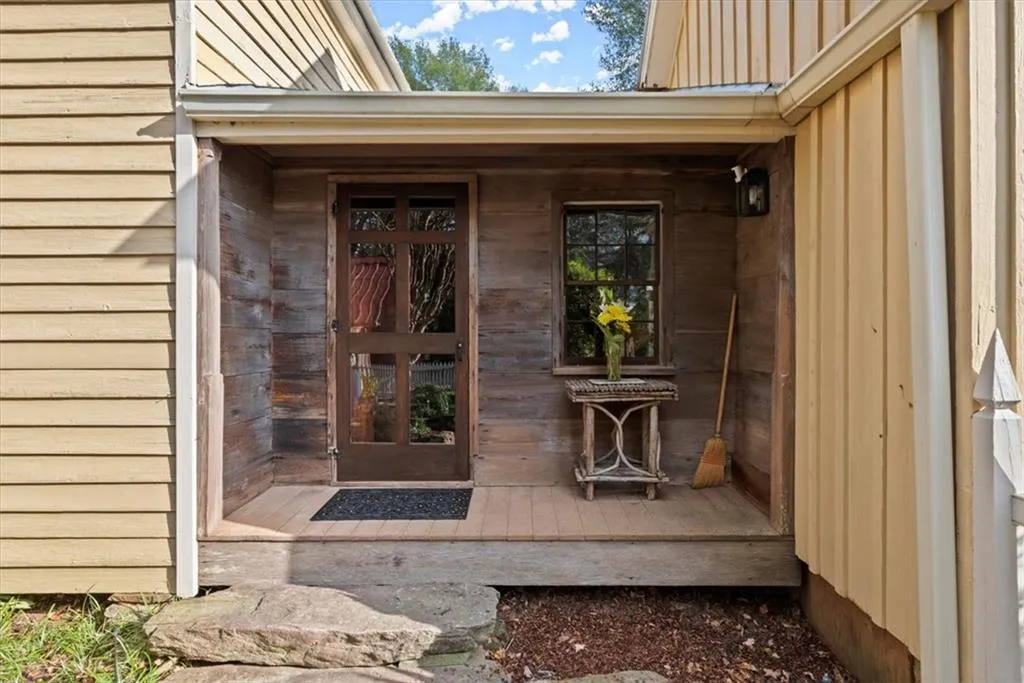Charming side entrance through the courtyard garden