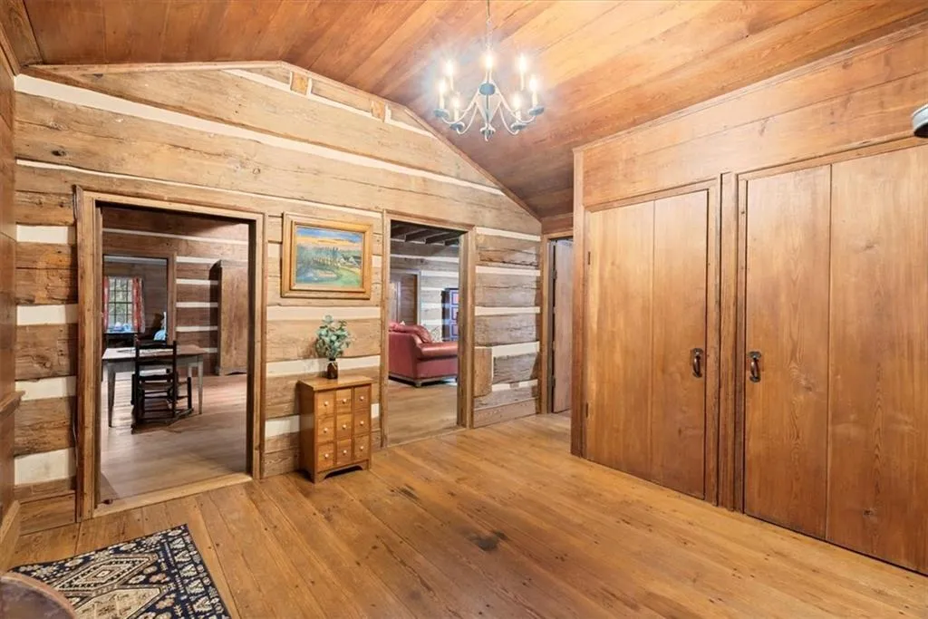The mud room, laundy and sunroom were built to connect the original farmhouse to the log cabin addition