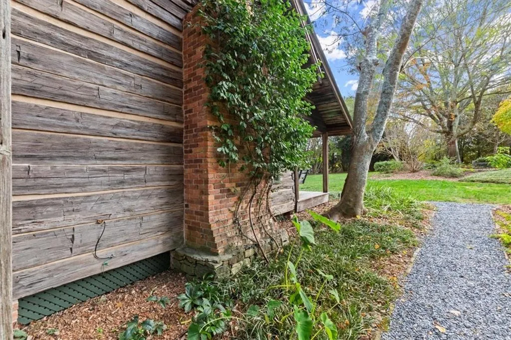Charming pathways connect all the various structures. Here we see the charming guest house chimney
