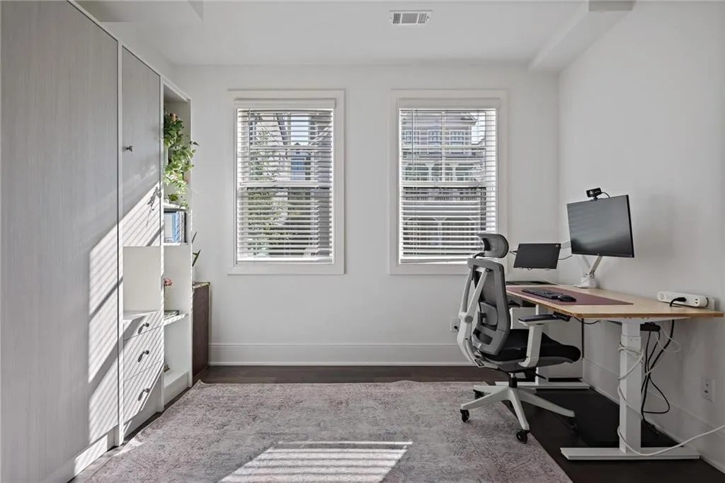 On the lower level, you will find the third bedroom with an en-suite bath that can be used as a separate home office, gym, or guest suite.