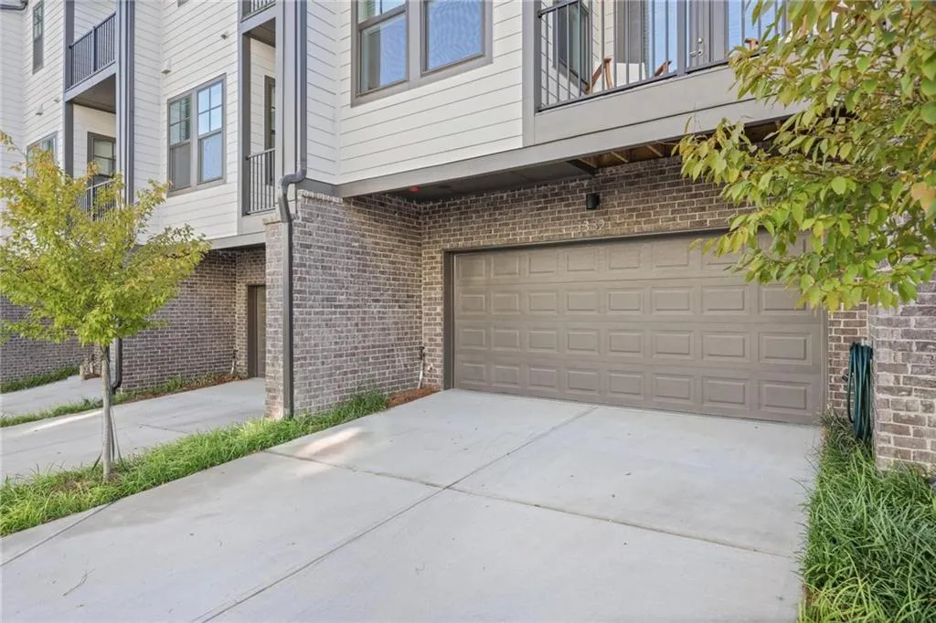 Two-car garage provides ample storage and convenient mudroom located inside entryway.