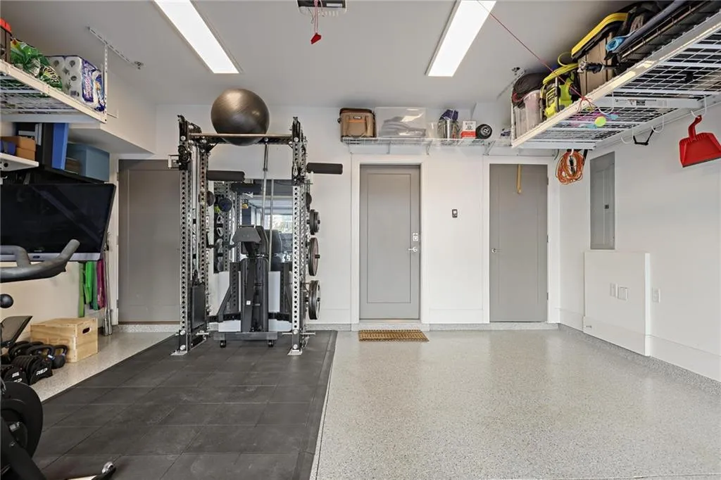 Two-car garage provides ample storage and convenient mudroom located inside entryway.