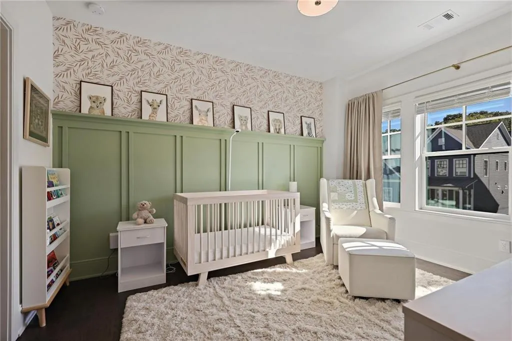 The adjacent guest bedroom includes an oversized walk-in closet and en-suite bath.
