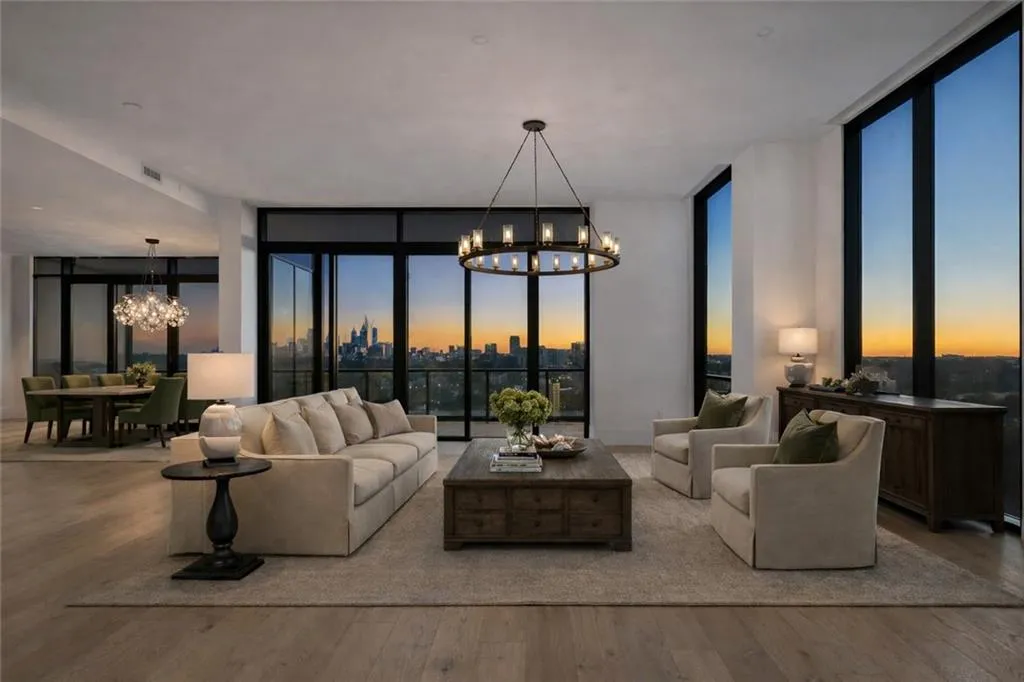 Expansive Corner Living Room with downtown and tree canopy views