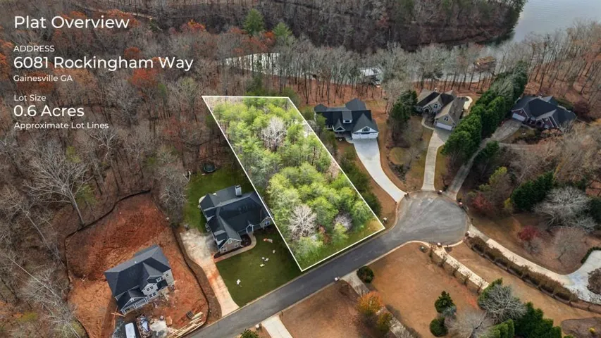 0.6-acre lot featuring mature trees and direct paved road frontage