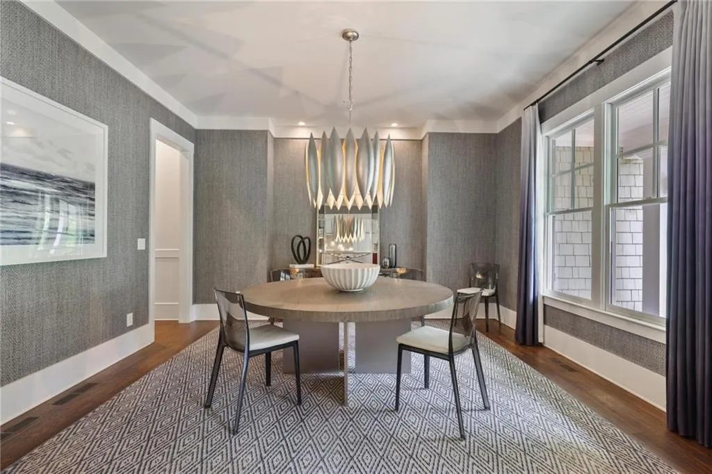 Dining room with dark wood-type flooring