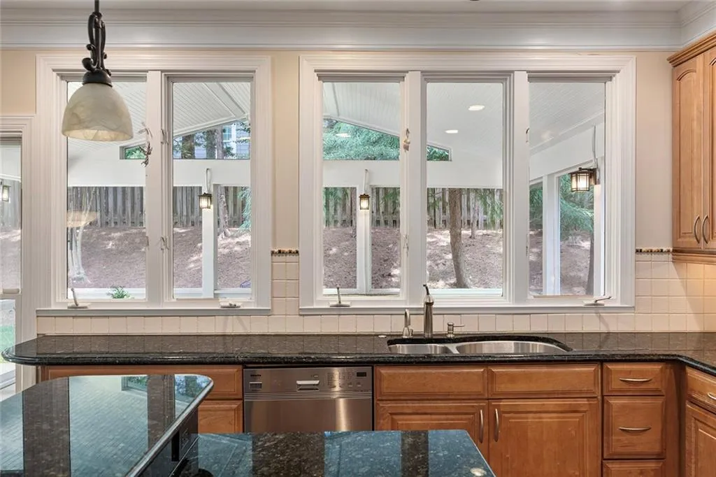 Kitchen Overlooking Screen porch/backyard
