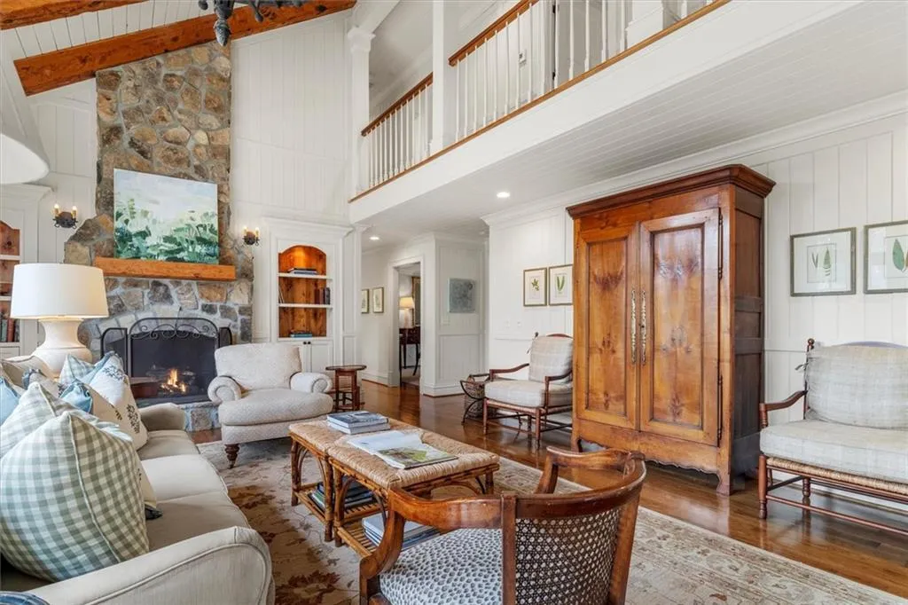 Family room /Main level offers tongue & groove ceiling & walls