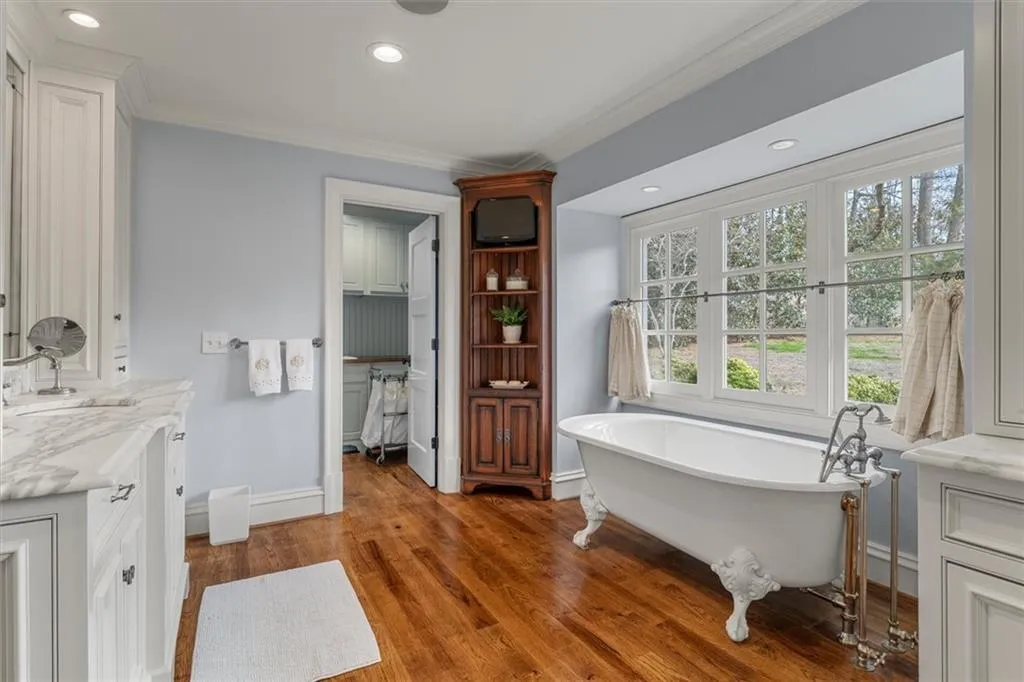 Primary bath with easy access to laundry room