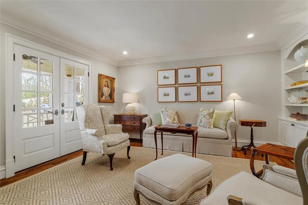 Front room opens through French door to the front porch