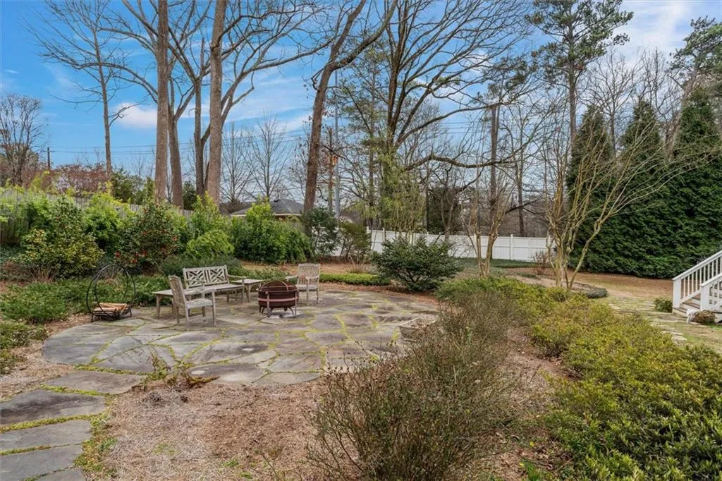 Blue stone patio, walkways & stone walls in back yard