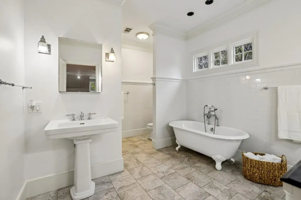 Primary Ensuite With Dual Vanities, Soaking Tub, & Separate Tiled Shower