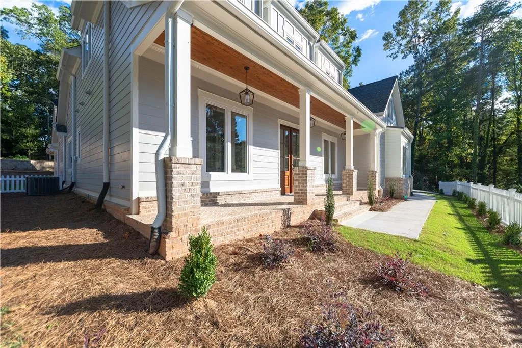 View of home's exterior featuring covered porch