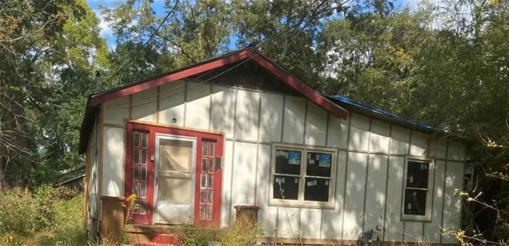 View of side of property with board and batten siding