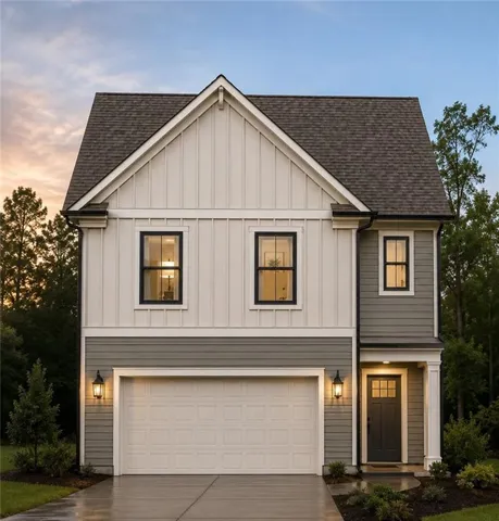 Two-story exterior with board and batten siding, horizontal siding, black-framed windows, an attached two-car garage, and a covered entry