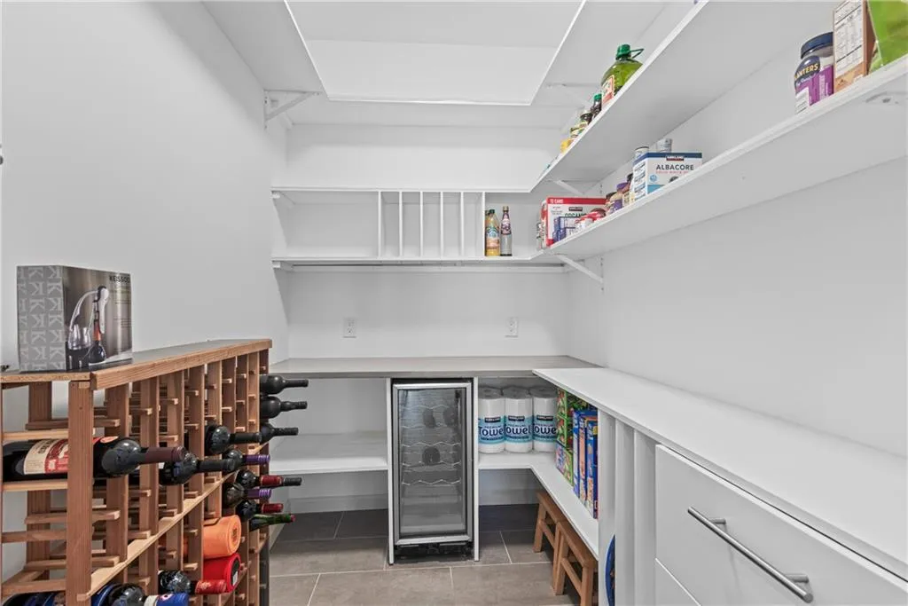 Large walk-in kitchen pantry.